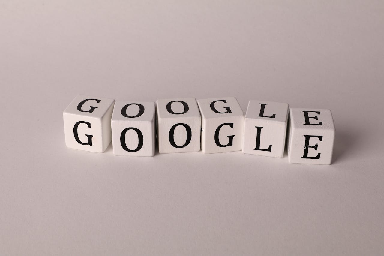 about-01 White blocks with letters spelling Google, symbolizing search and SEO concepts.